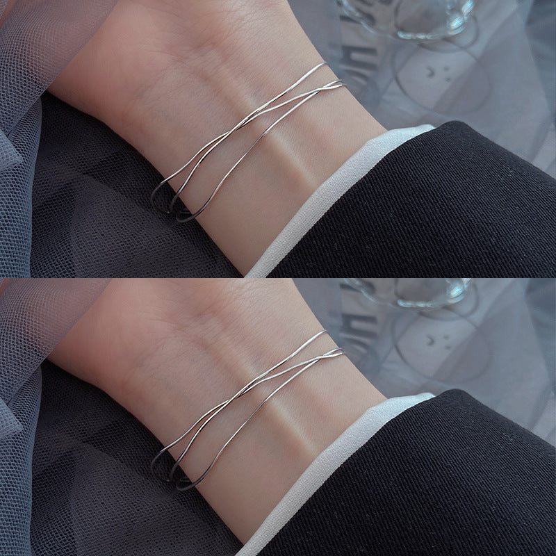 Silver snake chain bracelet layered design modern
